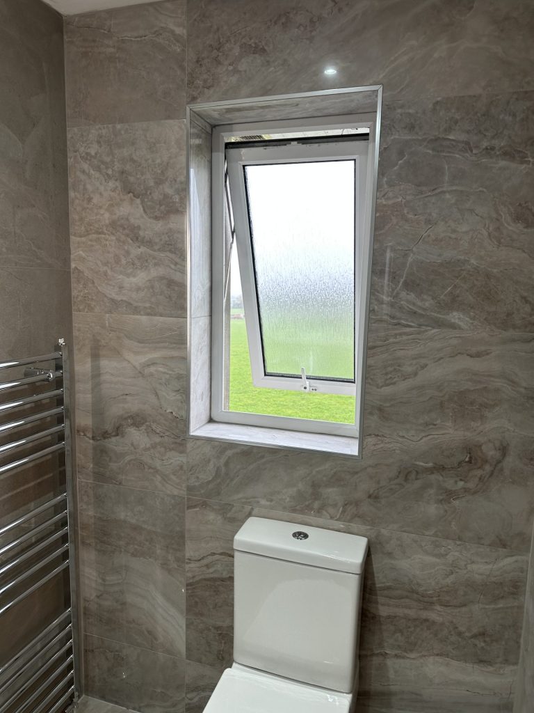 Bathroom with open window