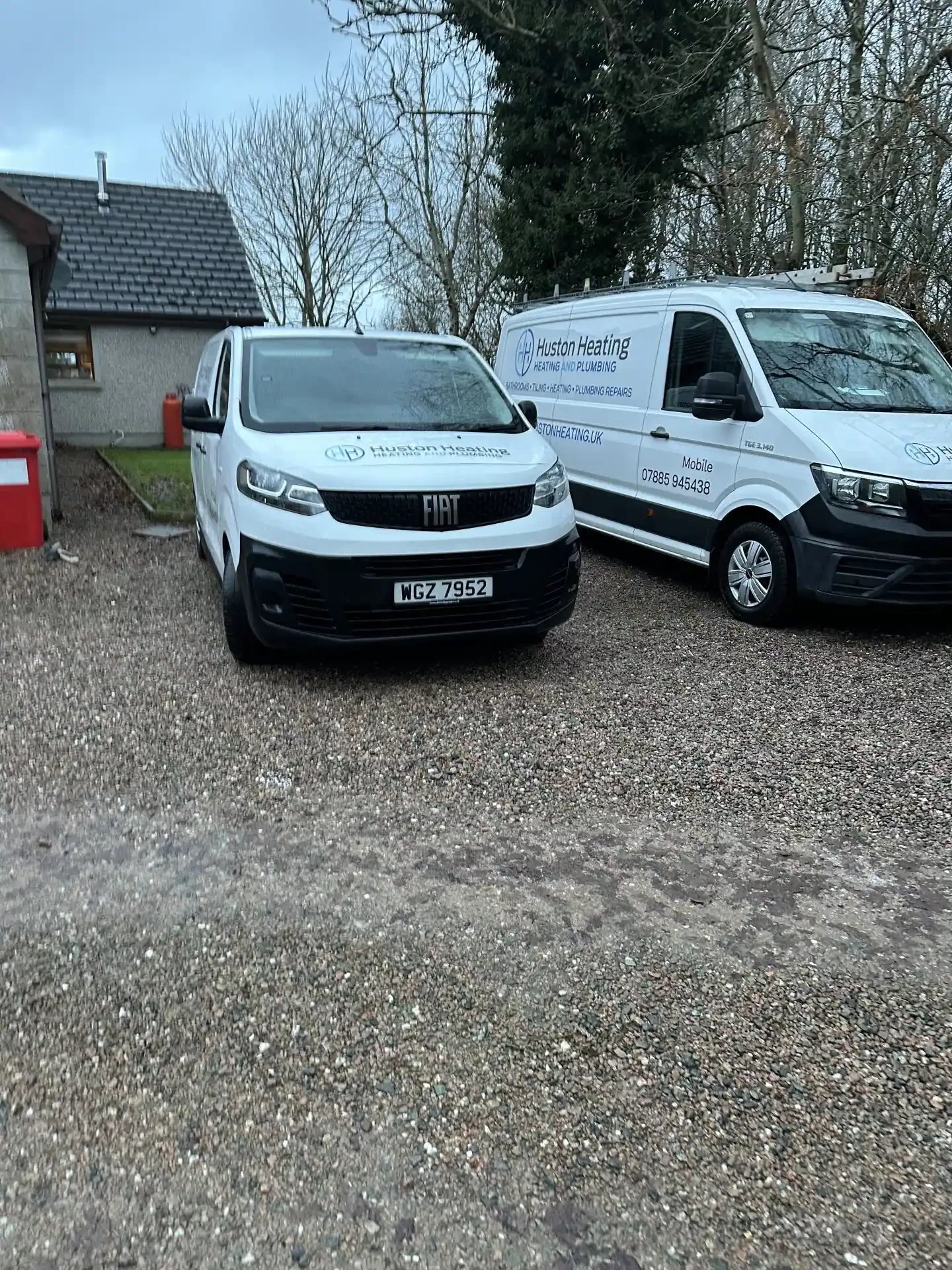 Two parked service vans